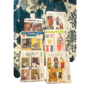 6 pack McCall’s, Butterick, and Simplicity Patterns. All new and unfolded!